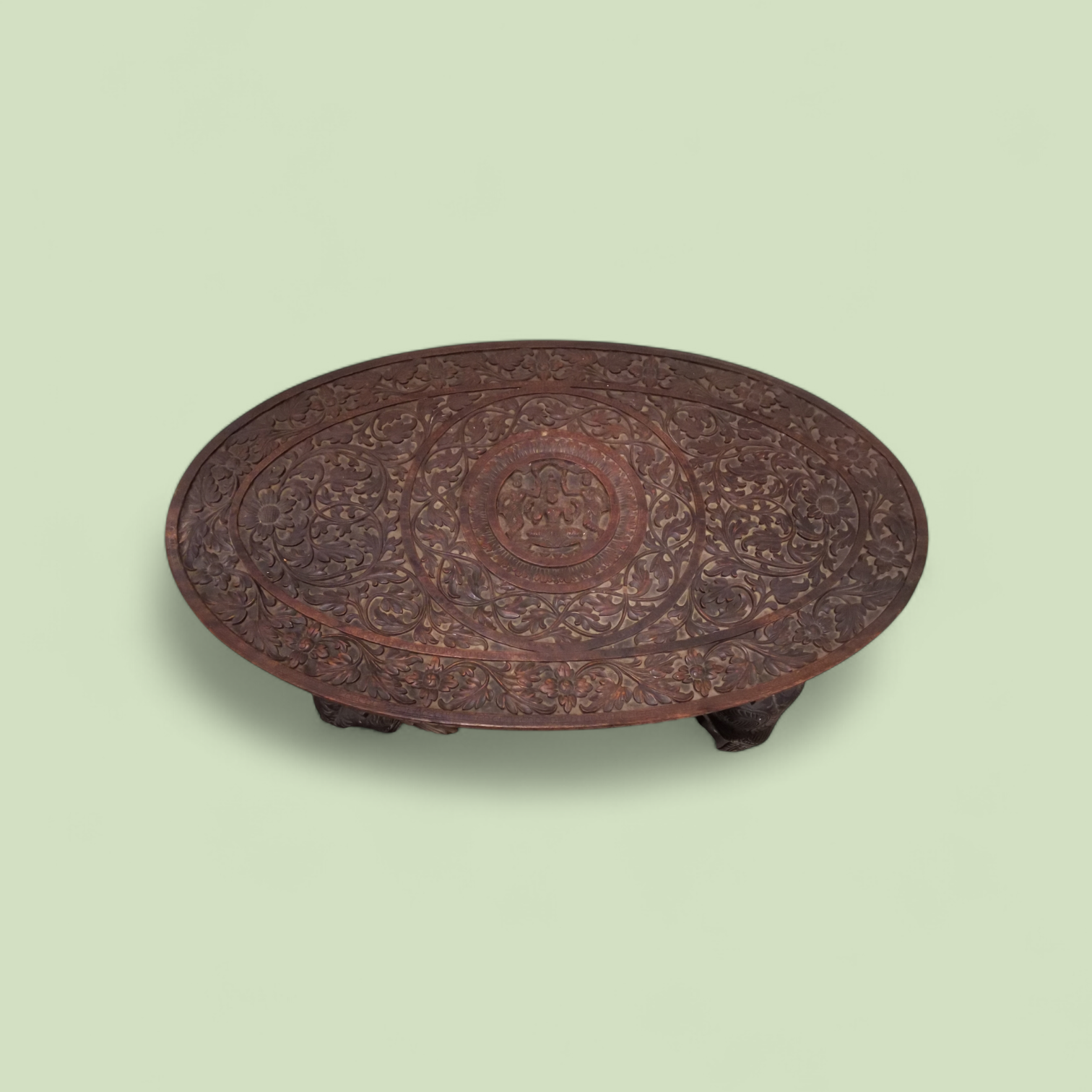 A Large 19th Century Oval Anglo-Indian Carved Hardwood Elephant Table with Solid Bone Tusks