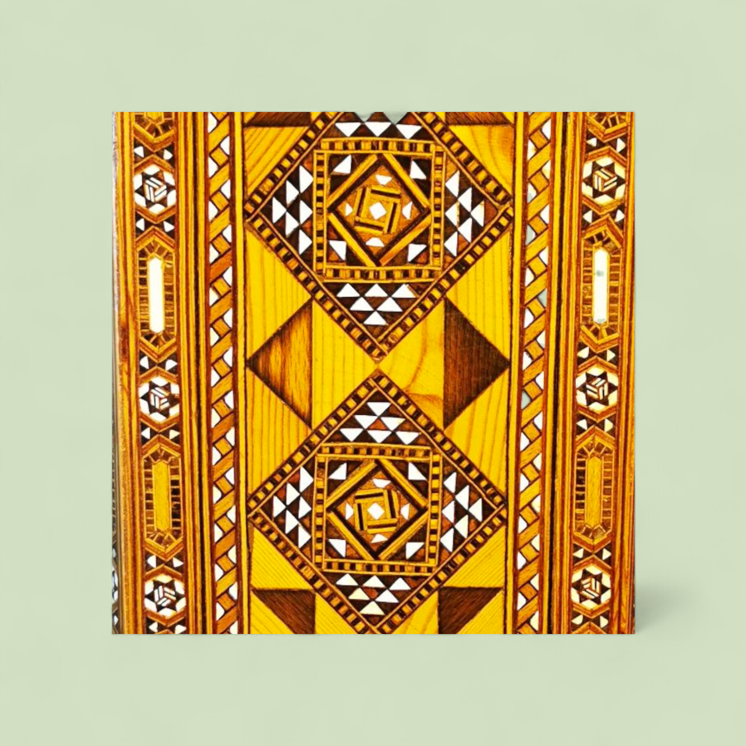 Italian Octagonal Inlaid Occasional Table, Mid 20th Century, circa 1960–1970, in the Manner of Carlo Bugatti